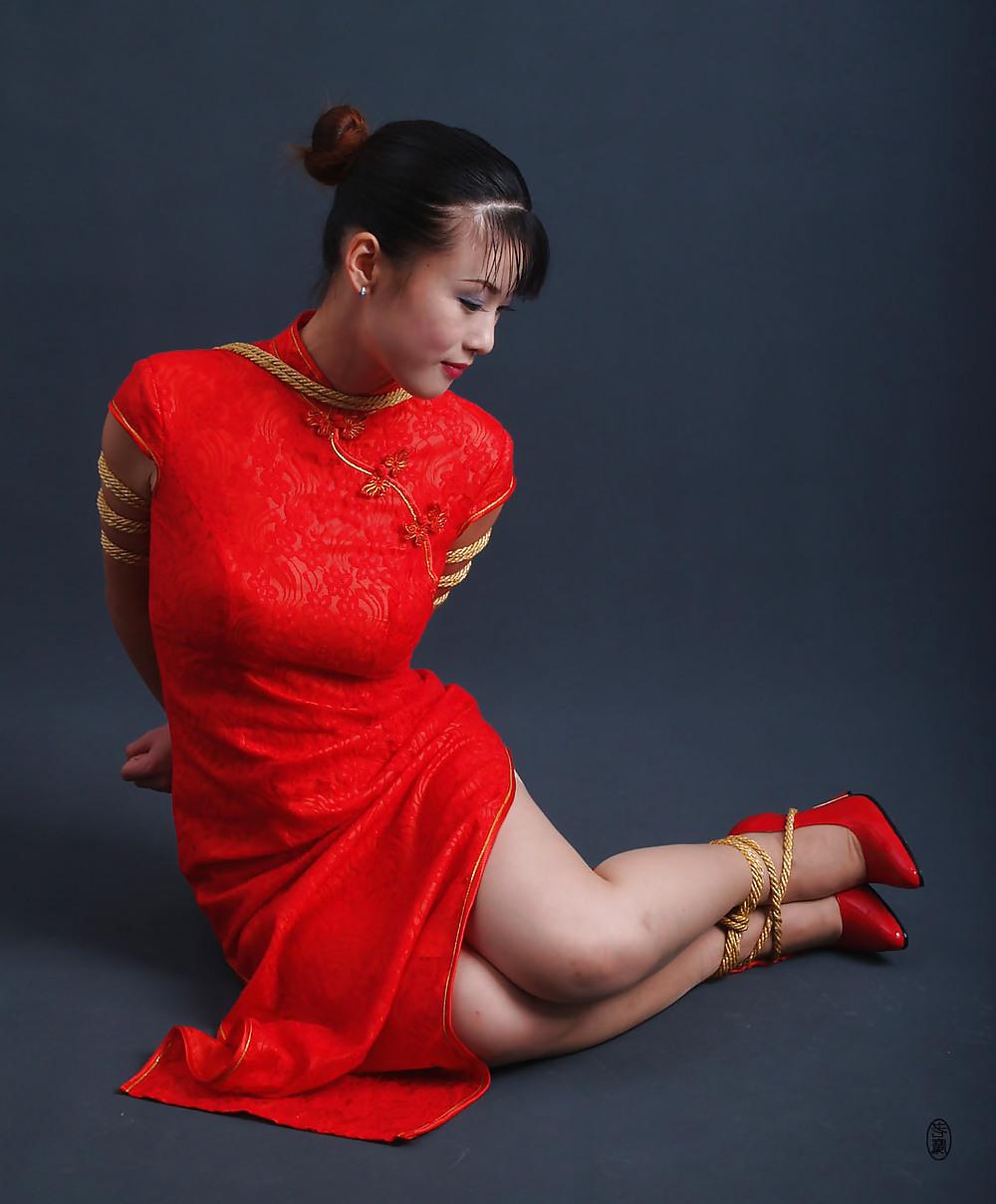 25P Asian beauty in bondage