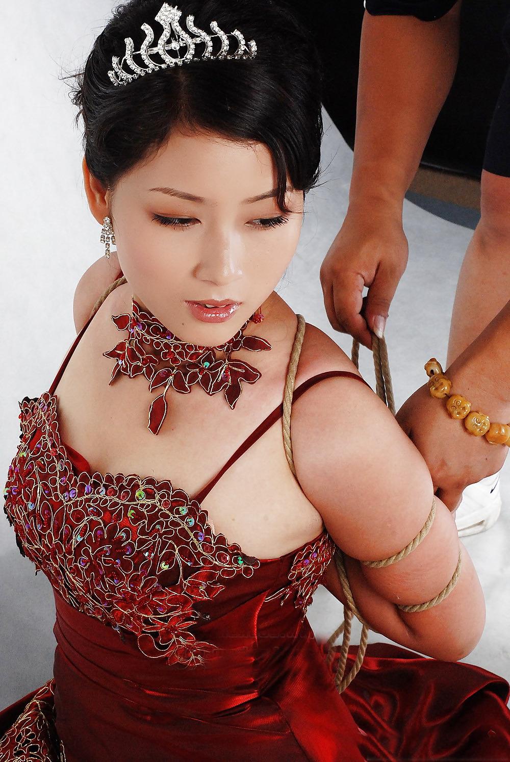 25P Asian beauty in bondage