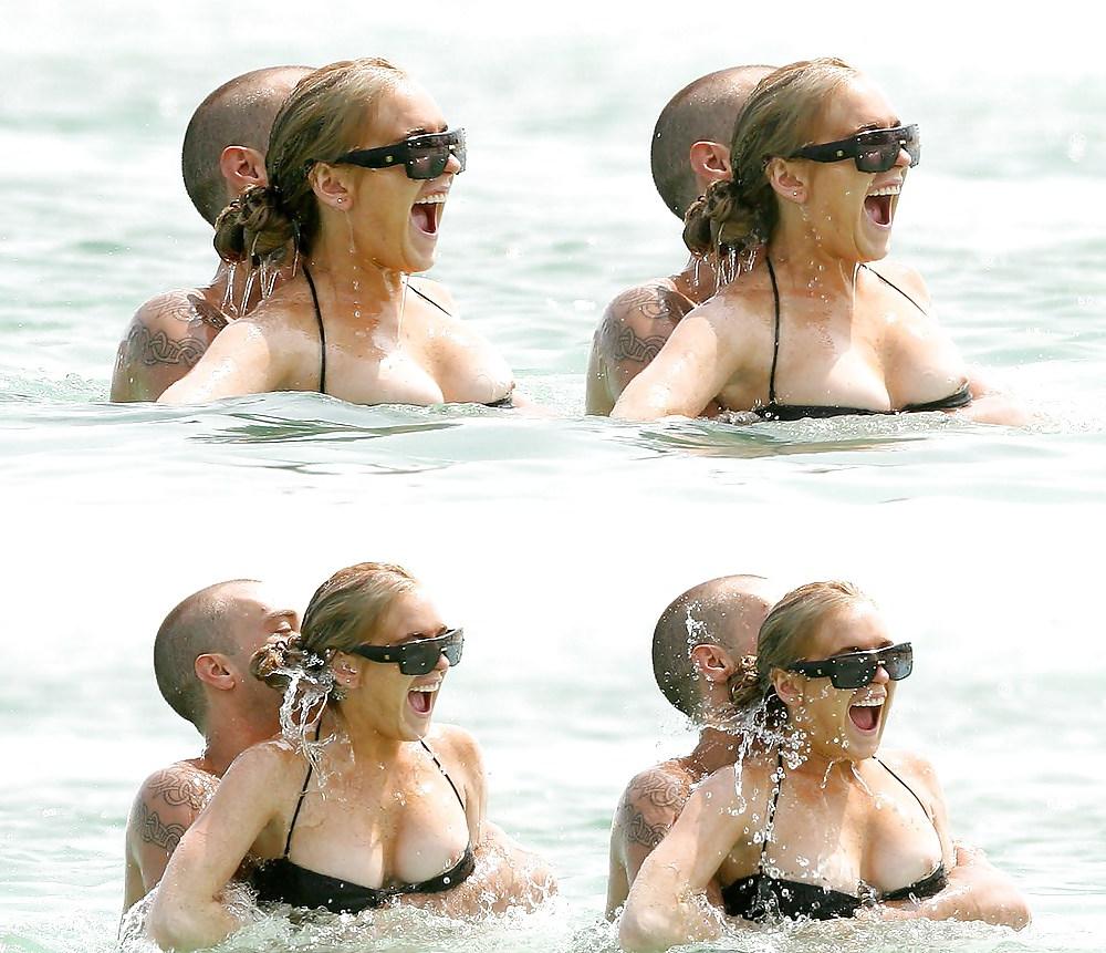 21P Lindsay Lohan ... Nipple In Black Bikini