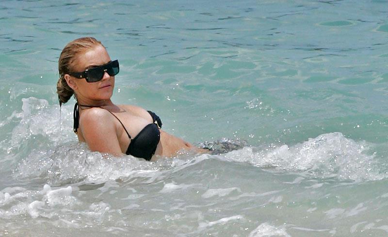 21P Lindsay Lohan ... Nipple In Black Bikini