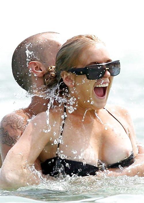 21P Lindsay Lohan ... Nipple In Black Bikini