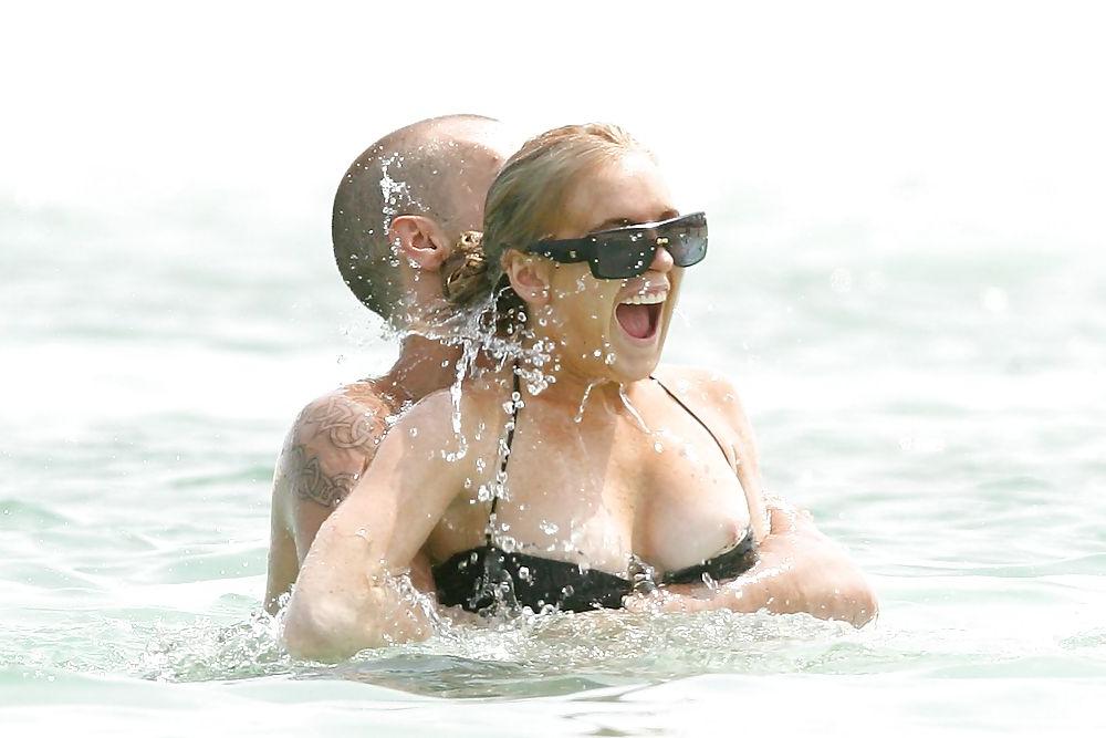21P Lindsay Lohan ... Nipple In Black Bikini