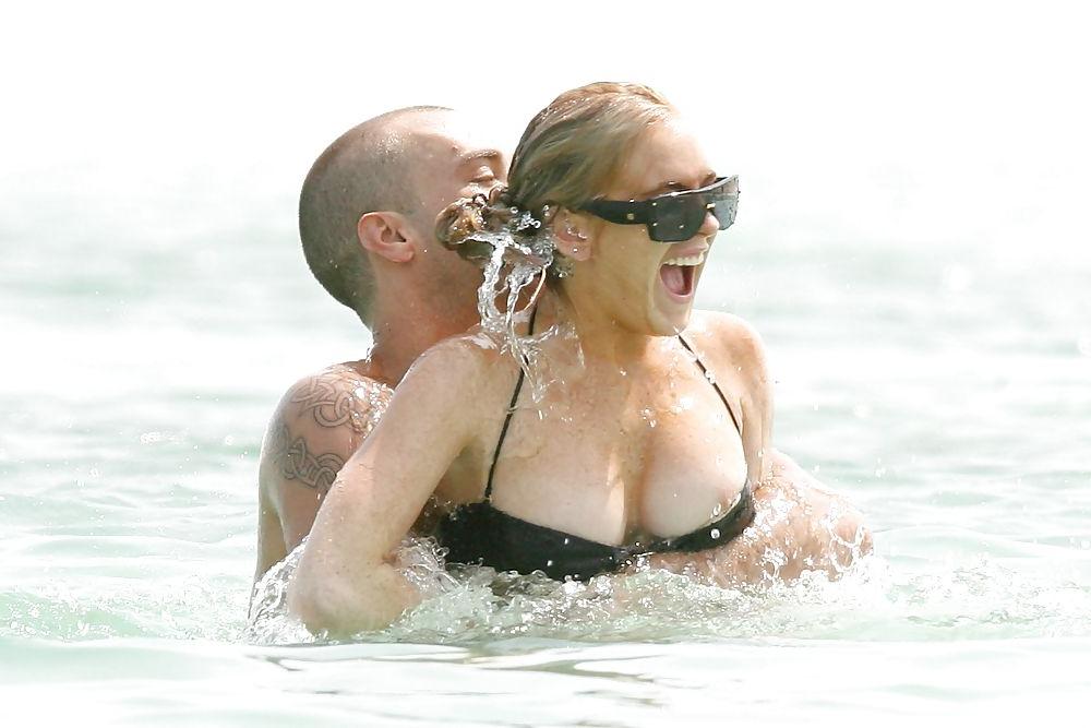 21P Lindsay Lohan ... Nipple In Black Bikini