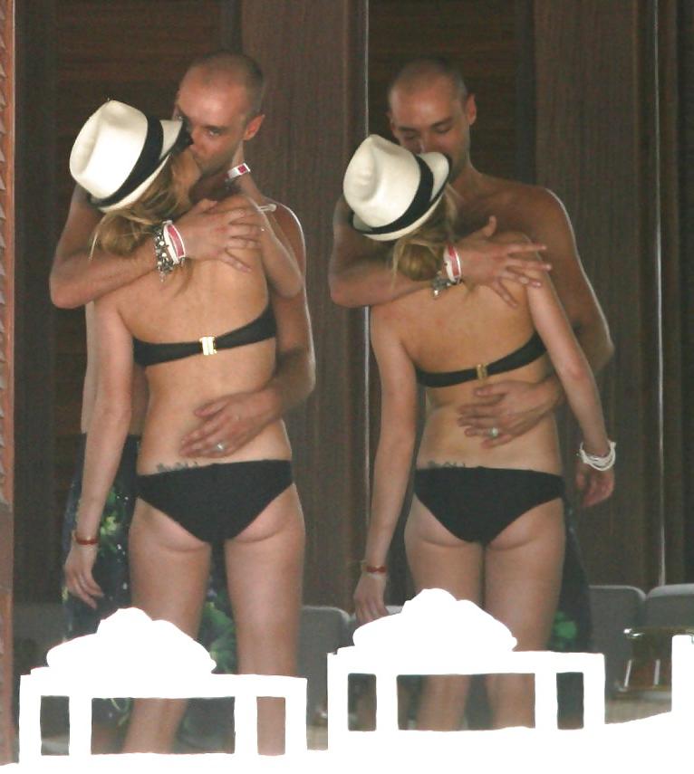 21P Lindsay Lohan ... Nipple In Black Bikini