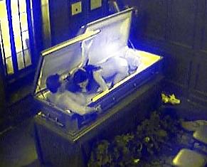 24P Gothic chicks getting naked in coffins