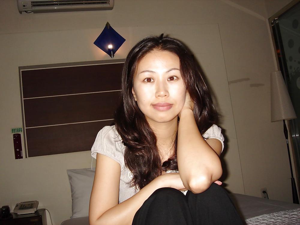 14P Korean girl taking a shower