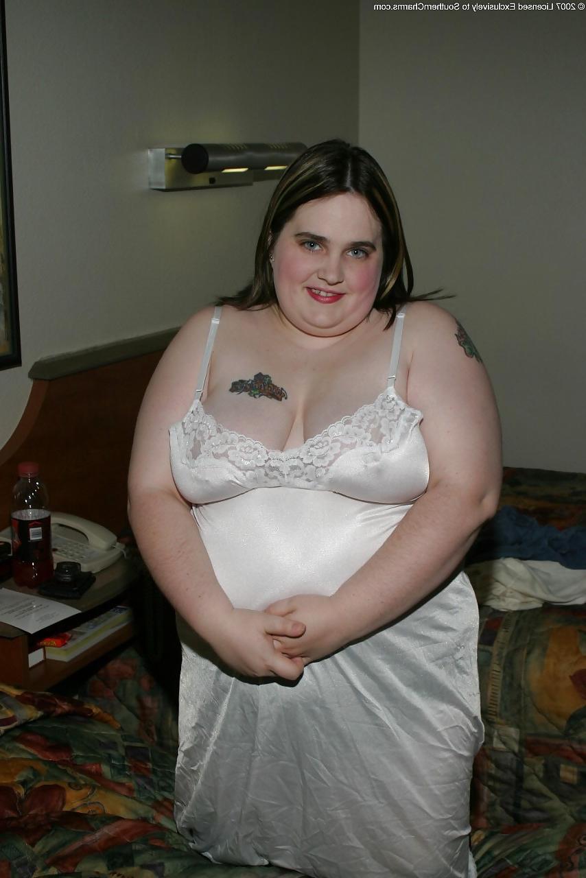 25P Kaylee in white slip with black stockings