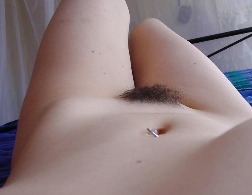 25P Erotic pics of a young girl with long hair - N. C. 