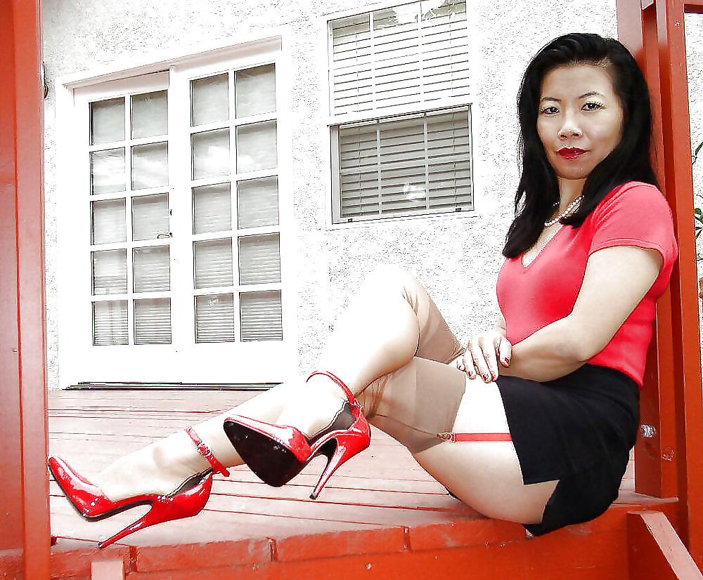 7P Mature Asian Lady In Seamed Stockings And Red High Heels