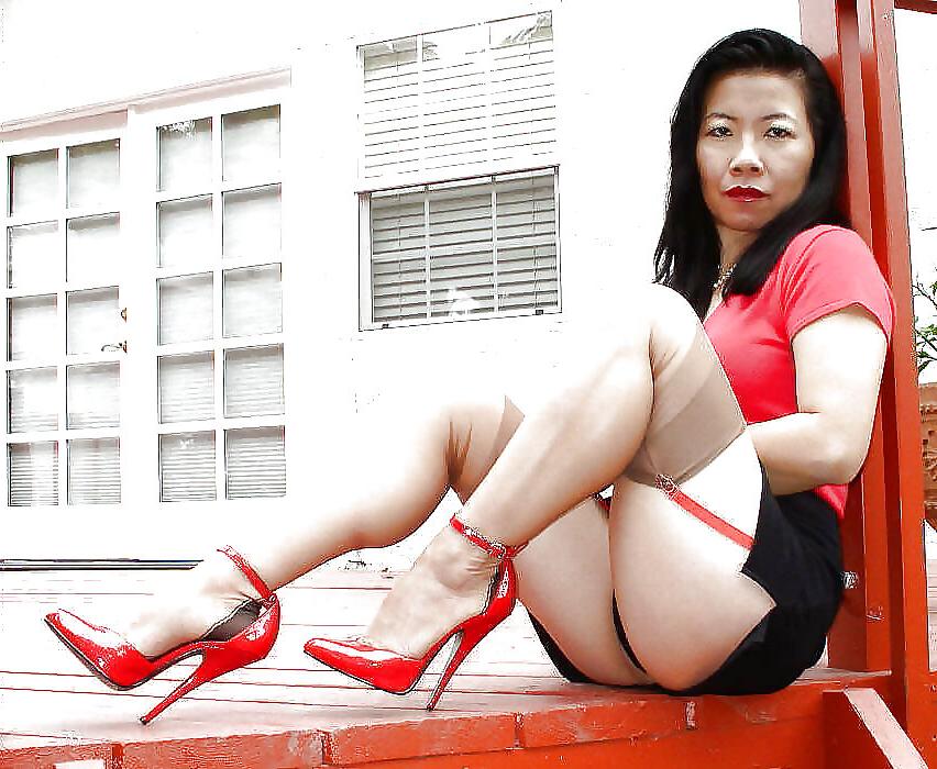 7P Mature Asian Lady In Seamed Stockings And Red High Heels