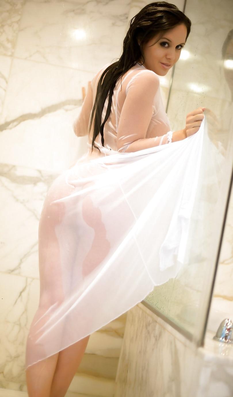 14P Busty Brunette getting wet under the shower