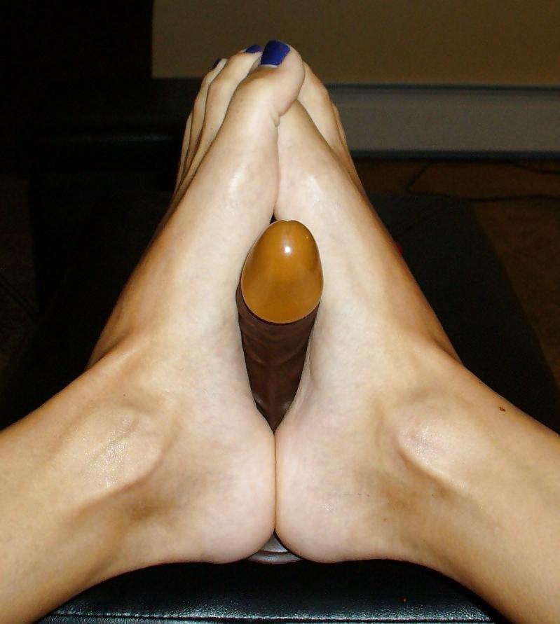11P Giving a footjob to my toy. :)