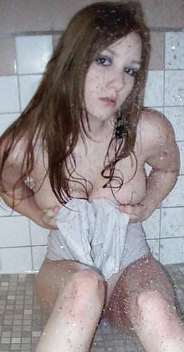 25P Sweet wetlook girl under the shower with her clothes on