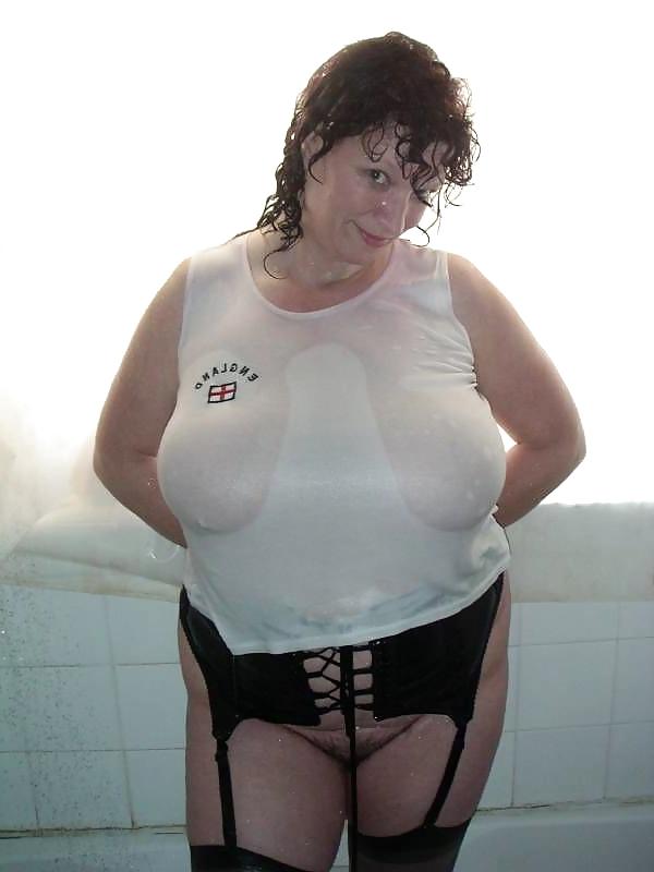 15P Busty mature in the shower