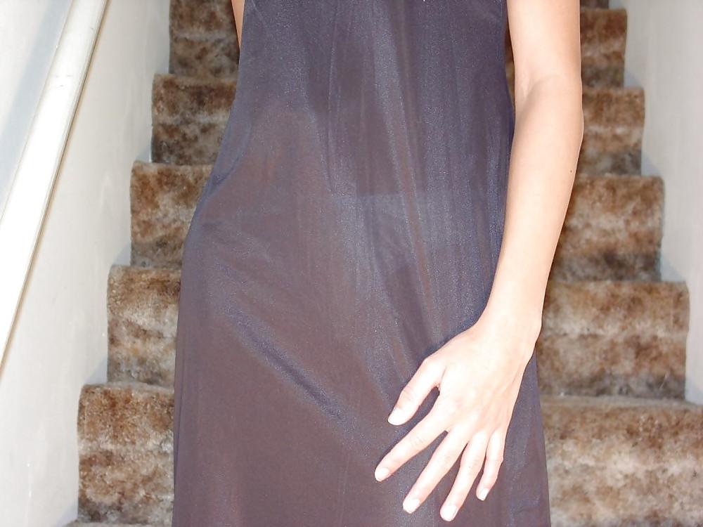 25P Teen In Black Satin Slip