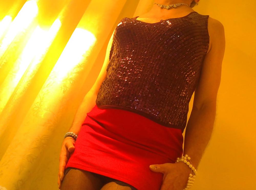 21P Sexy in red skirt, black stockings and sexy lingerie