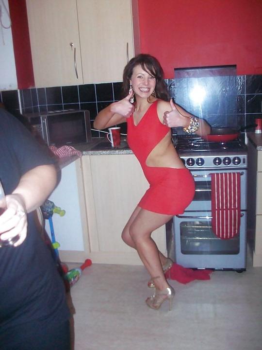 13P British Lady In Red From Leeds Do You No Her?