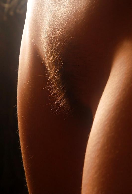 20P Dark-blonde girl posing her hot body on a chair