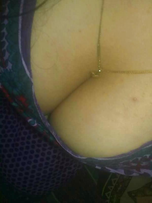 8P Her cleavage ...