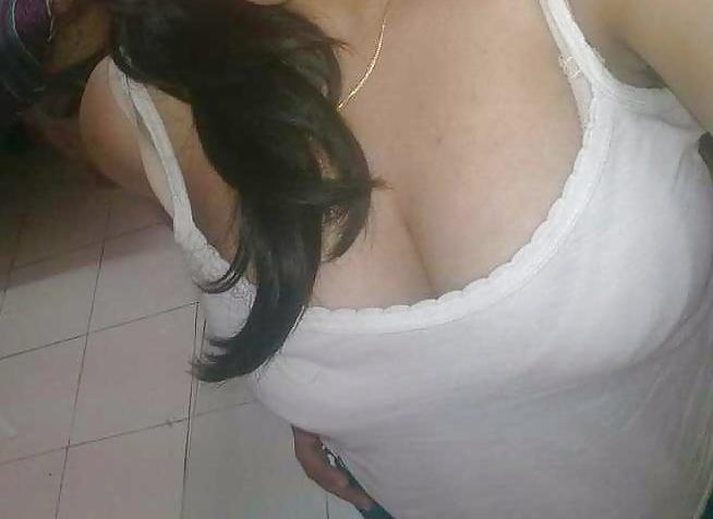 8P Her cleavage ...