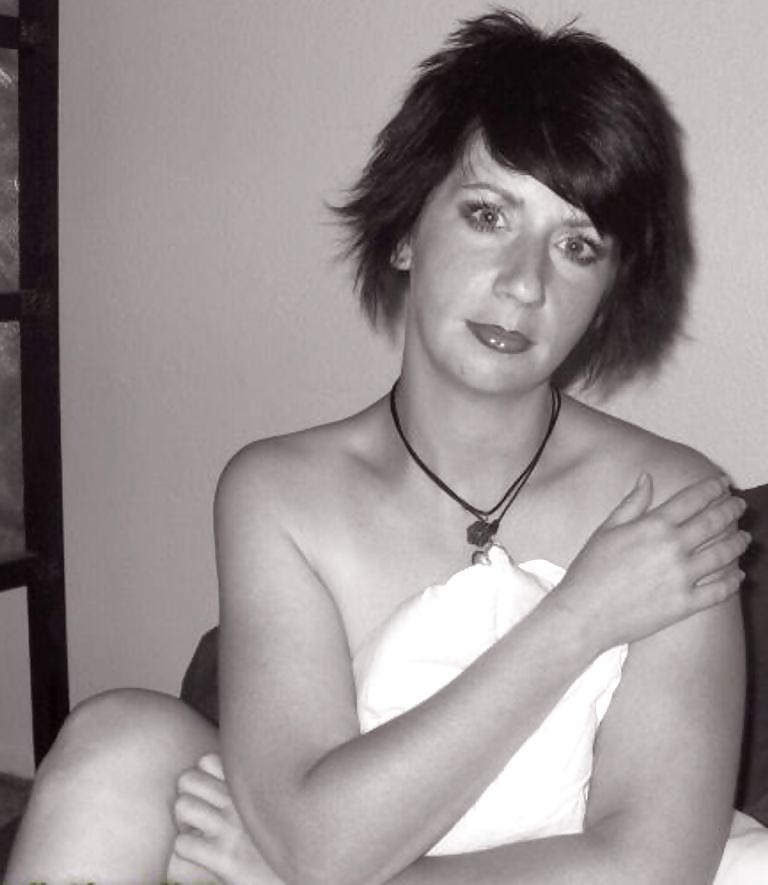 10P Private Pics of a hot MILF with short hair and shaved pussy