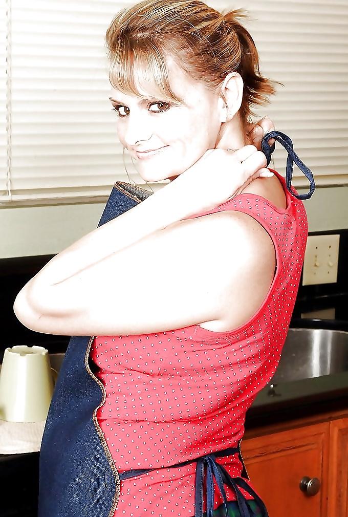 14P Hot housewife in the kitchen