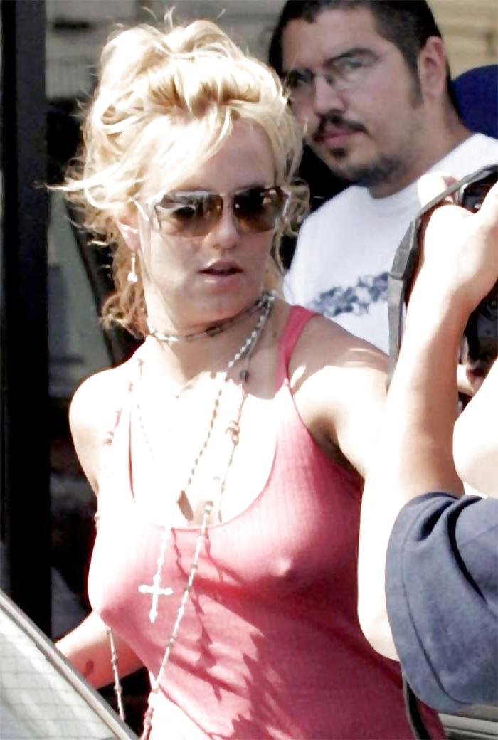 25P Britney's cleavage makes men happy.