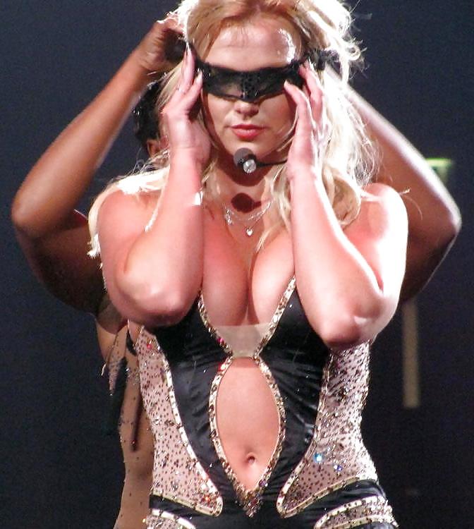 25P Britney's cleavage makes men happy.