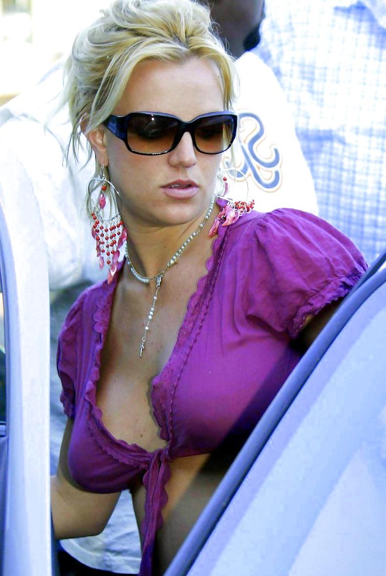25P Britney's cleavage makes men happy.