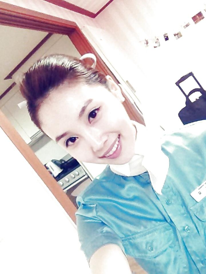 25P Korean air hostess in public
