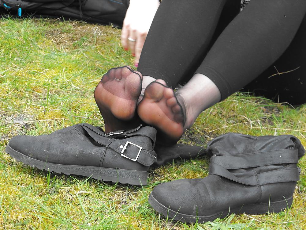 12P Em showing her sexy feet in the forest in black tights