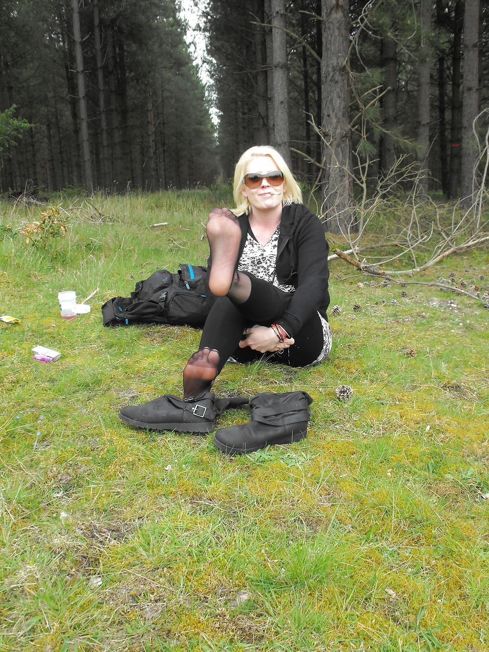 12P Em showing her sexy feet in the forest in black tights