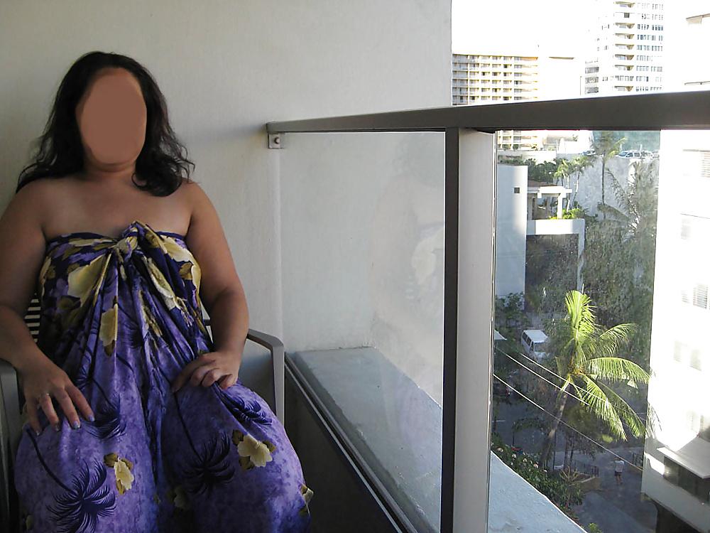 17P My Asian wife spreading on hotel bed and flashing on balcony