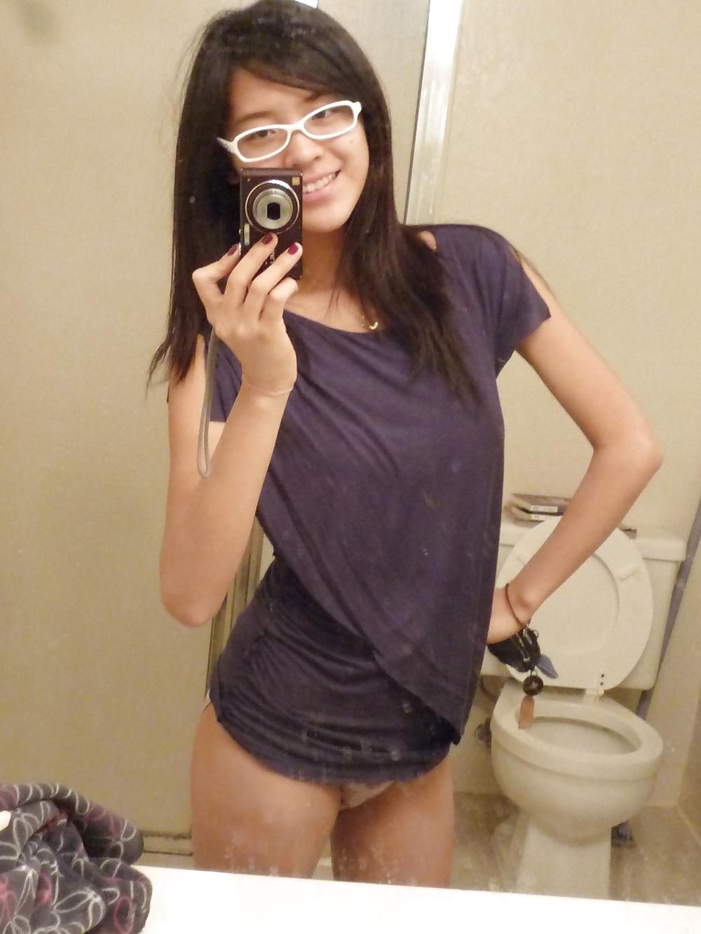 25P Sexy asian teen with glasses