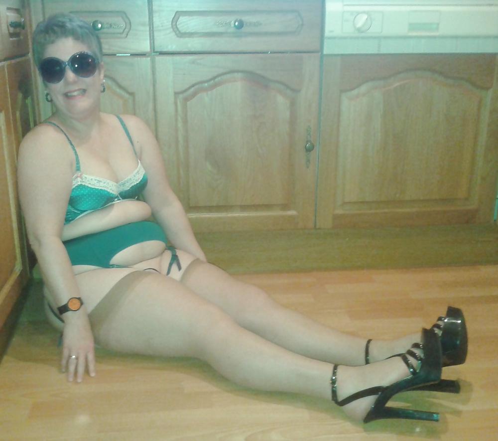 24P In the kitchen in stockings and heels