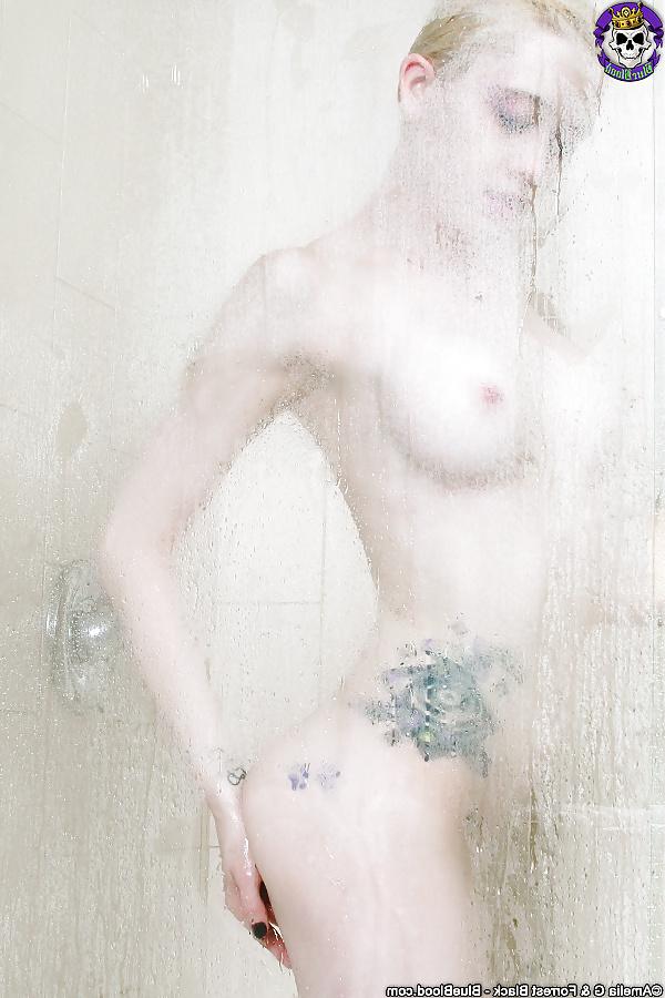 14P Cute ass petite raver girl in shower