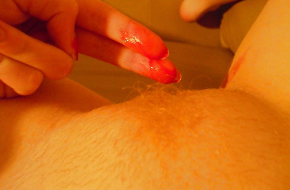 18P Redhead teen shows herself II