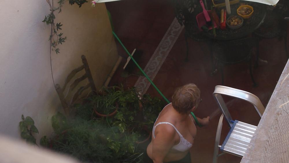 21P Mature busty neighbor