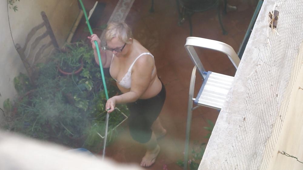 21P Mature busty neighbor