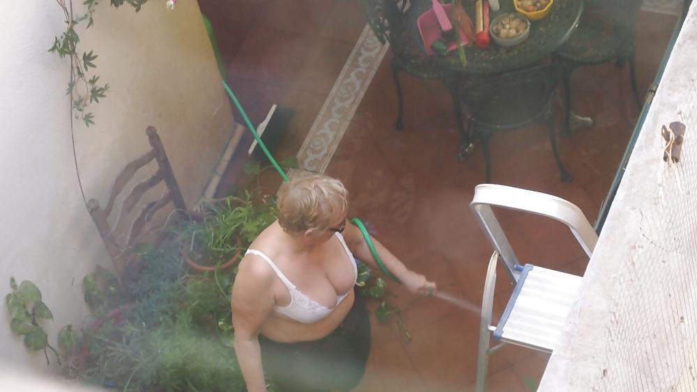 21P Mature busty neighbor