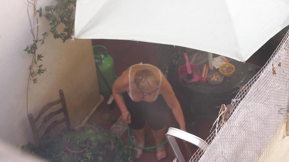 21P Mature busty neighbor