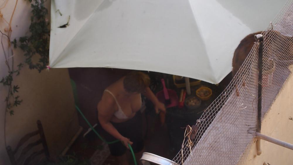 21P Mature busty neighbor