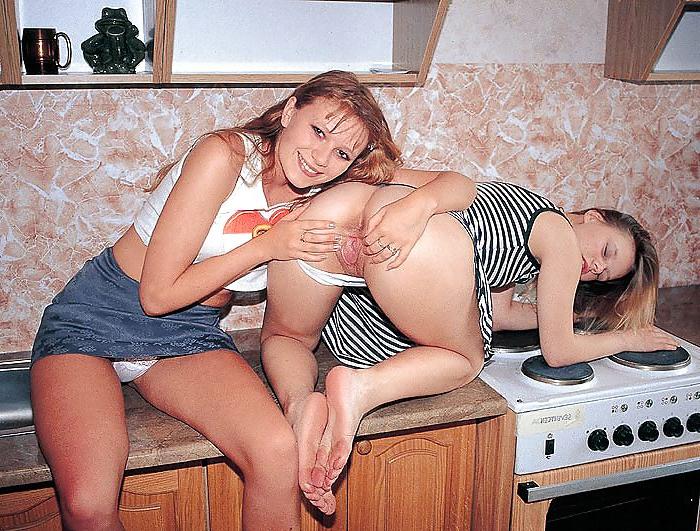 20P Two hot girls playing in the kitchen