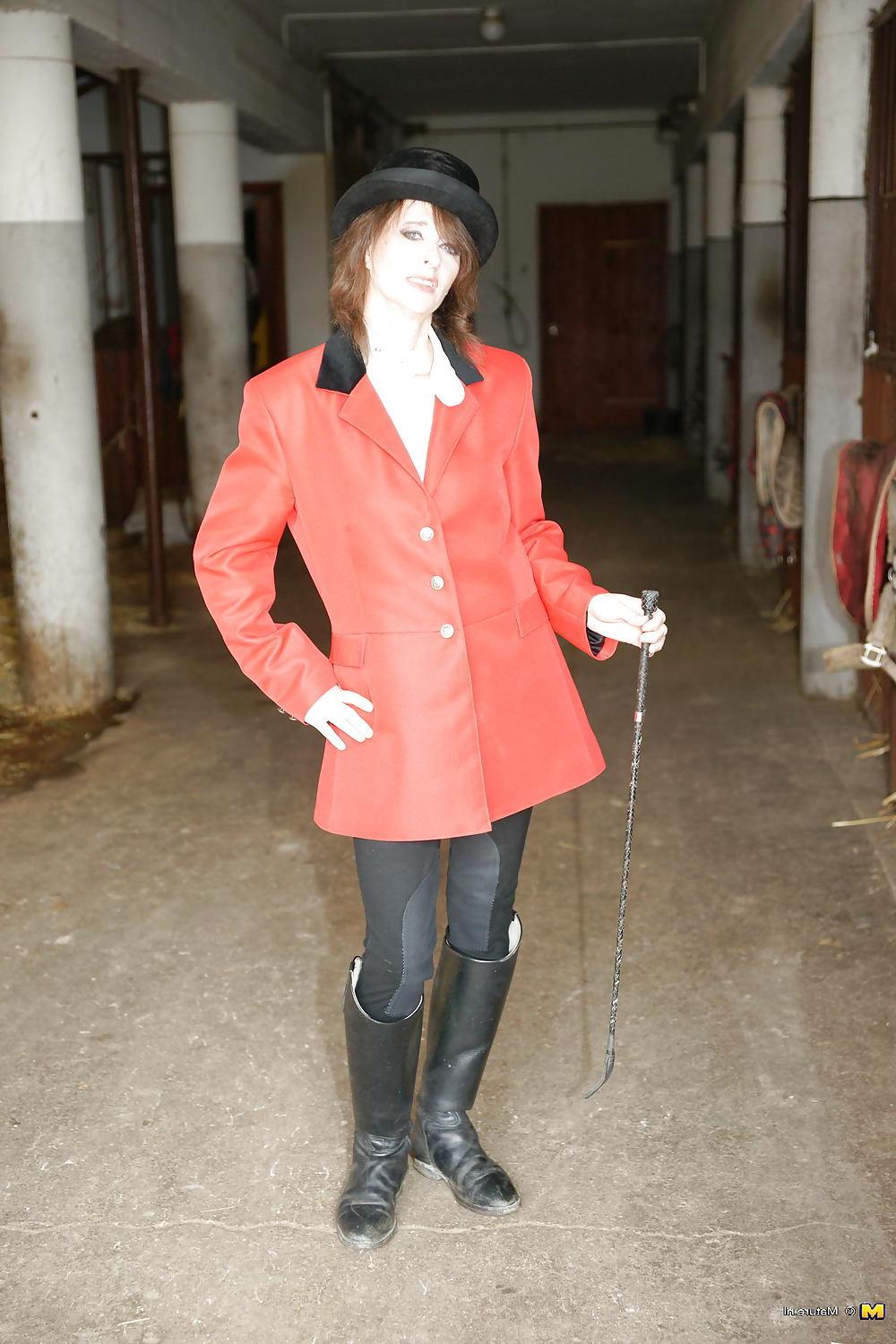 25P Women in and out of their riding gear,