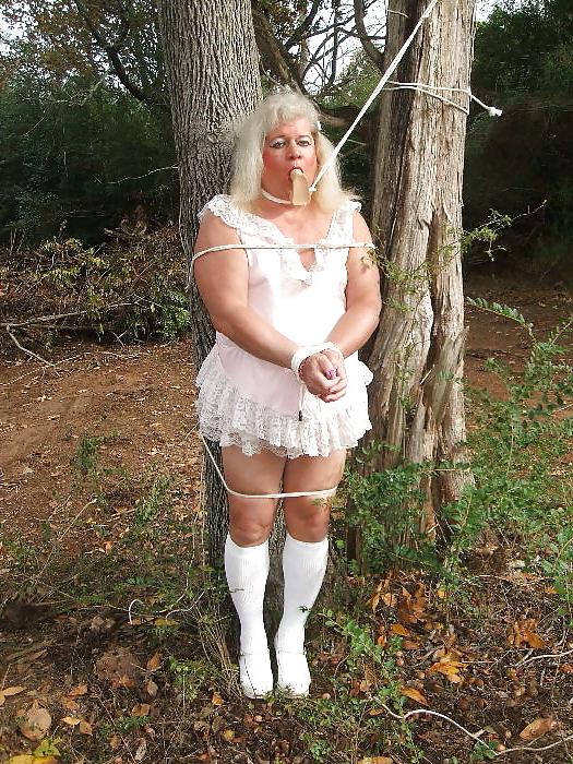 25P Sissy male pansy tied to a tree in public