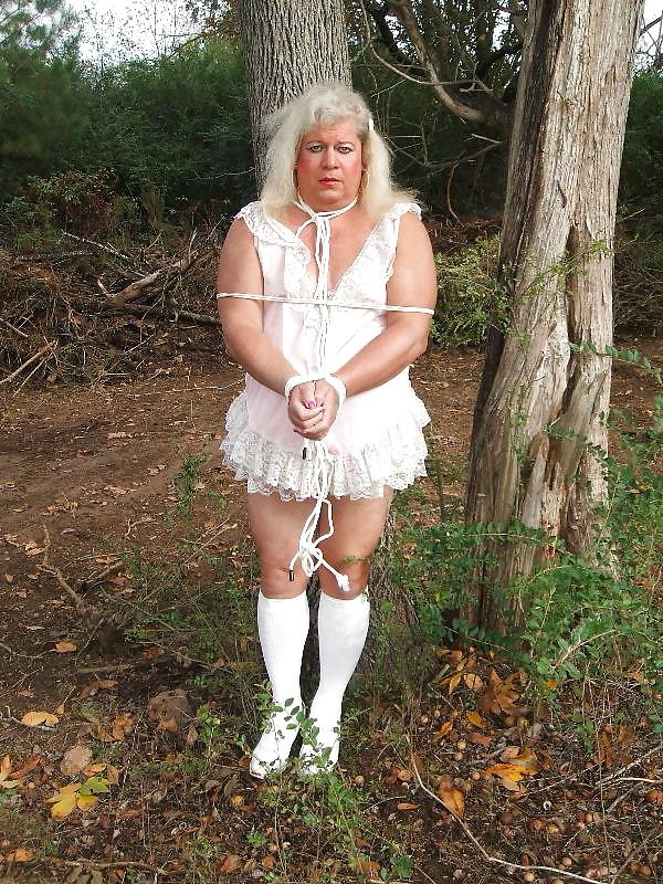25P Sissy male pansy tied to a tree in public