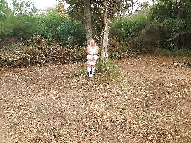 25P Sissy male pansy tied to a tree in public