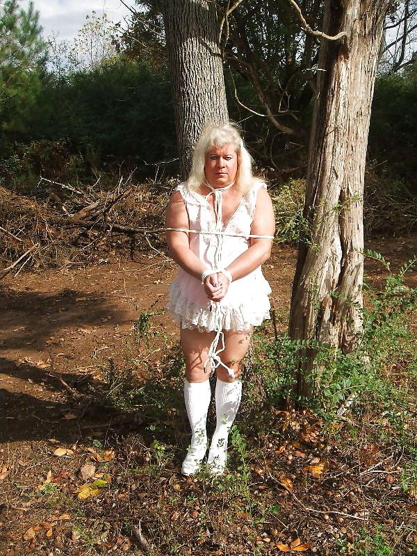 25P Sissy male pansy tied to a tree in public