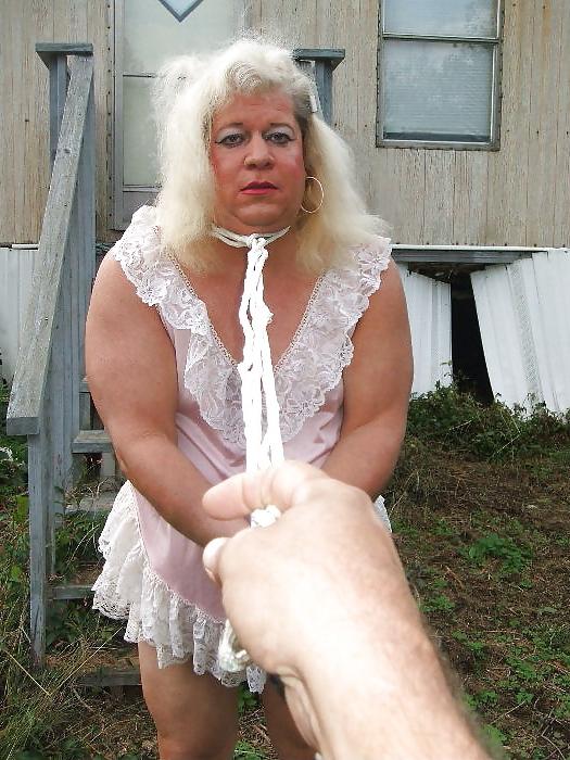 25P Sissy male pansy tied to a tree in public