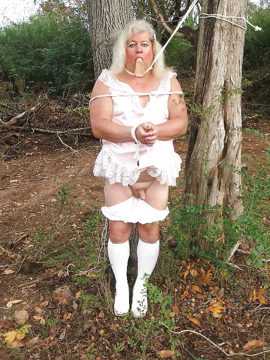 25P Sissy male pansy tied to a tree in public